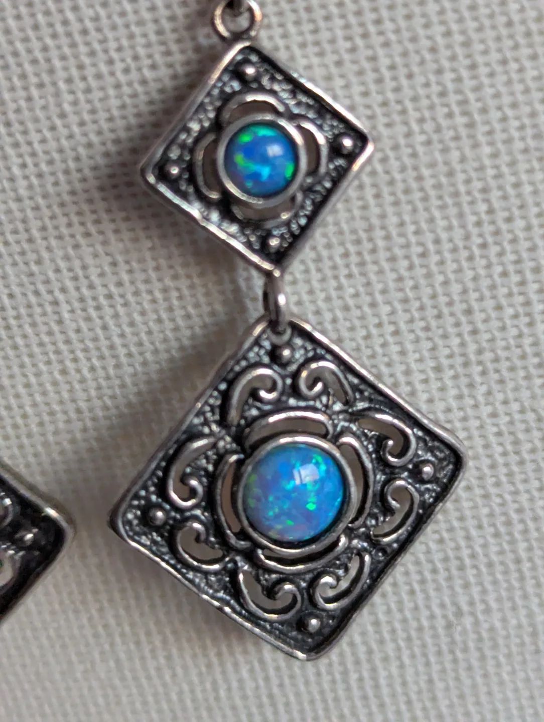 Stunning blue opals set in 925 silver dangle Earrings image indicator(5)