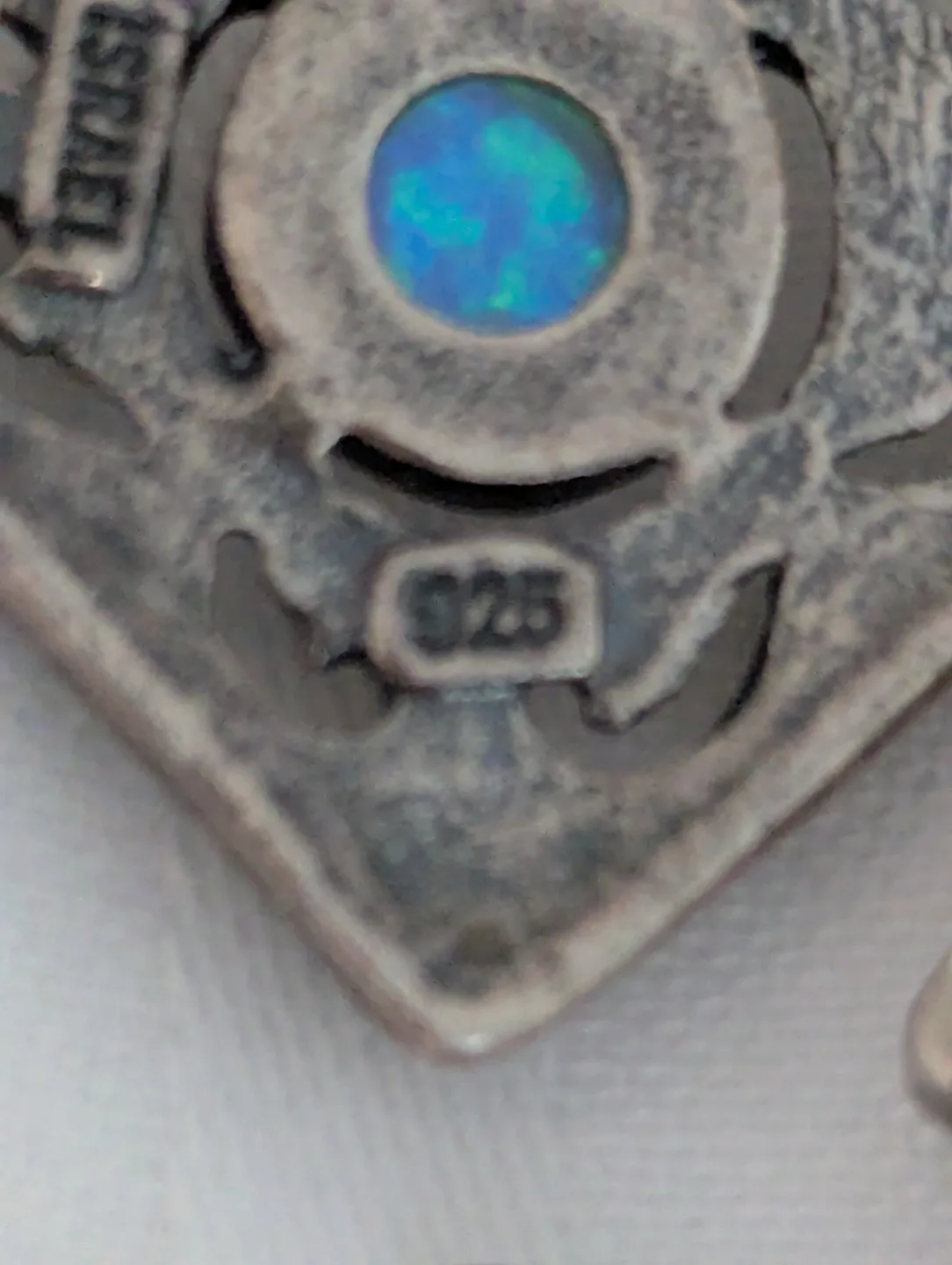 Stunning blue opals set in 925 silver dangle Earrings image indicator(7)