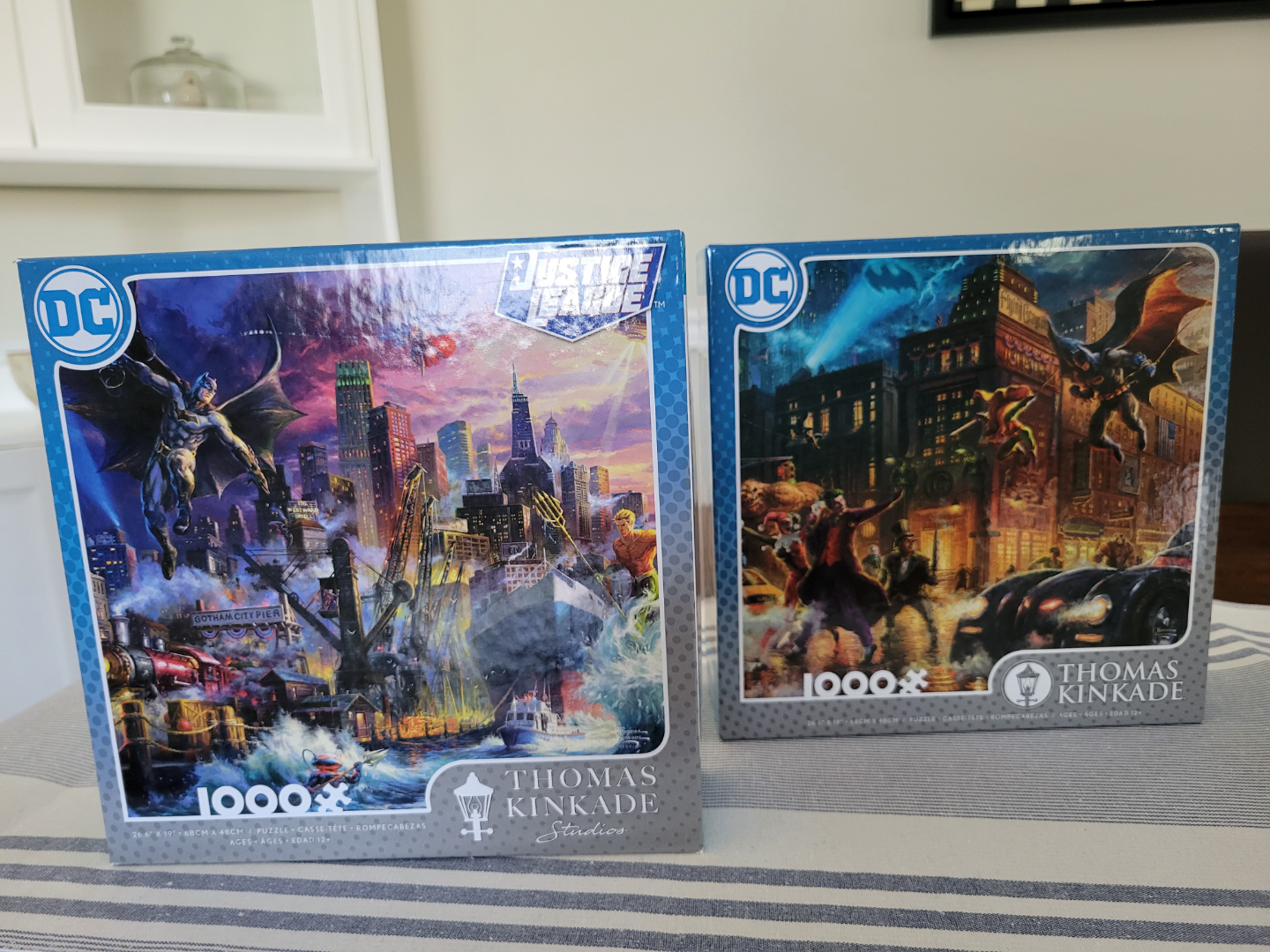 Two Thomas Kinkade Studios DC Justice League 1000-Piece Puzzles