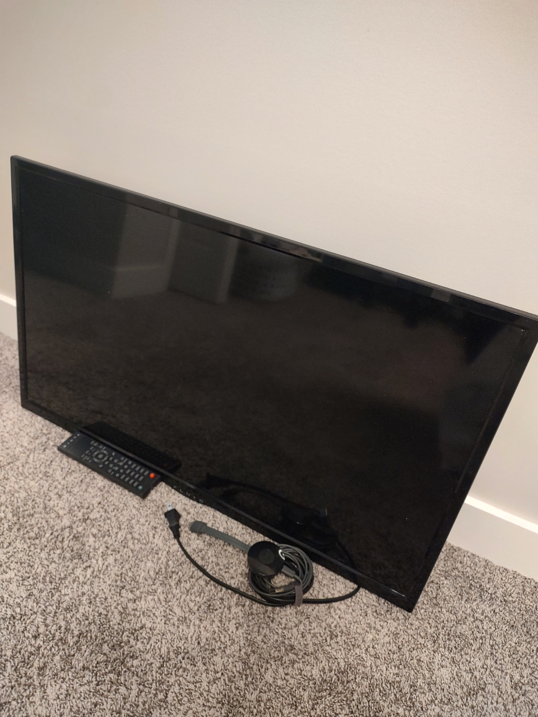 fluid TV with remote, Google Chromecast, hooks for wall mount