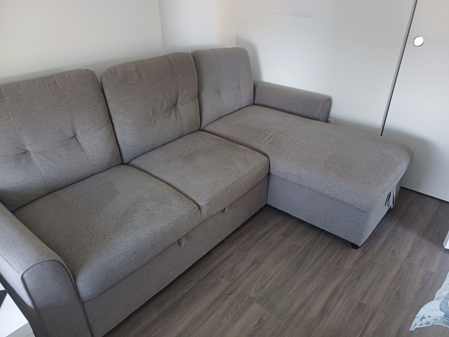 Grey Sectional Sofa with Pull-Out Sleeper and Storage