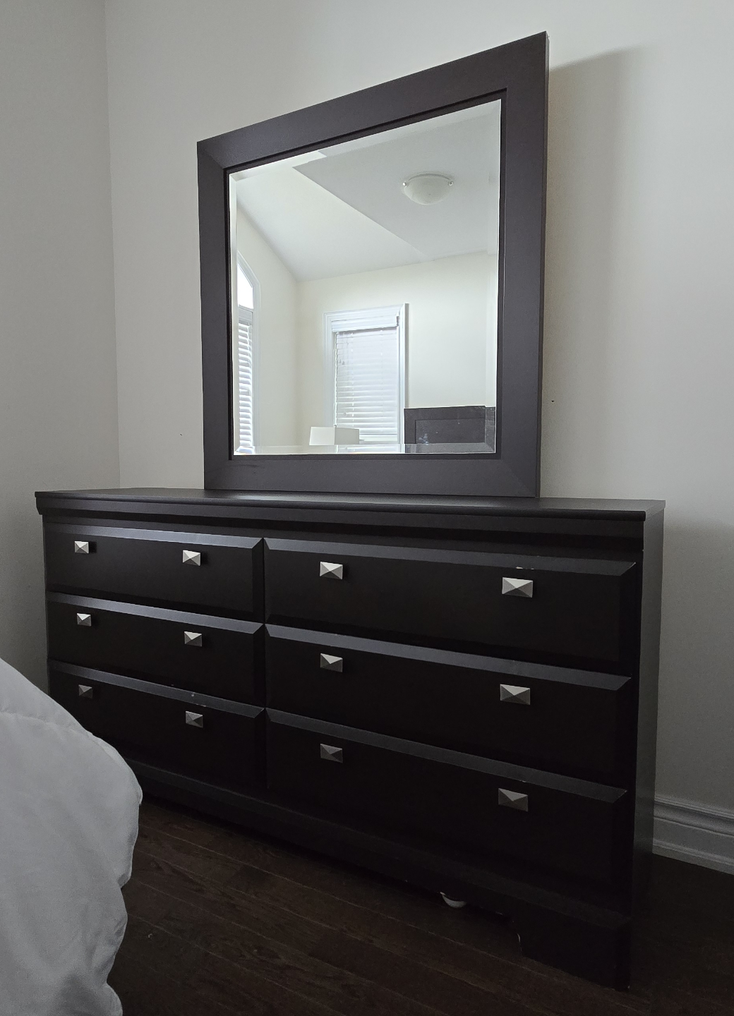 Dark brown dresser with mirror
