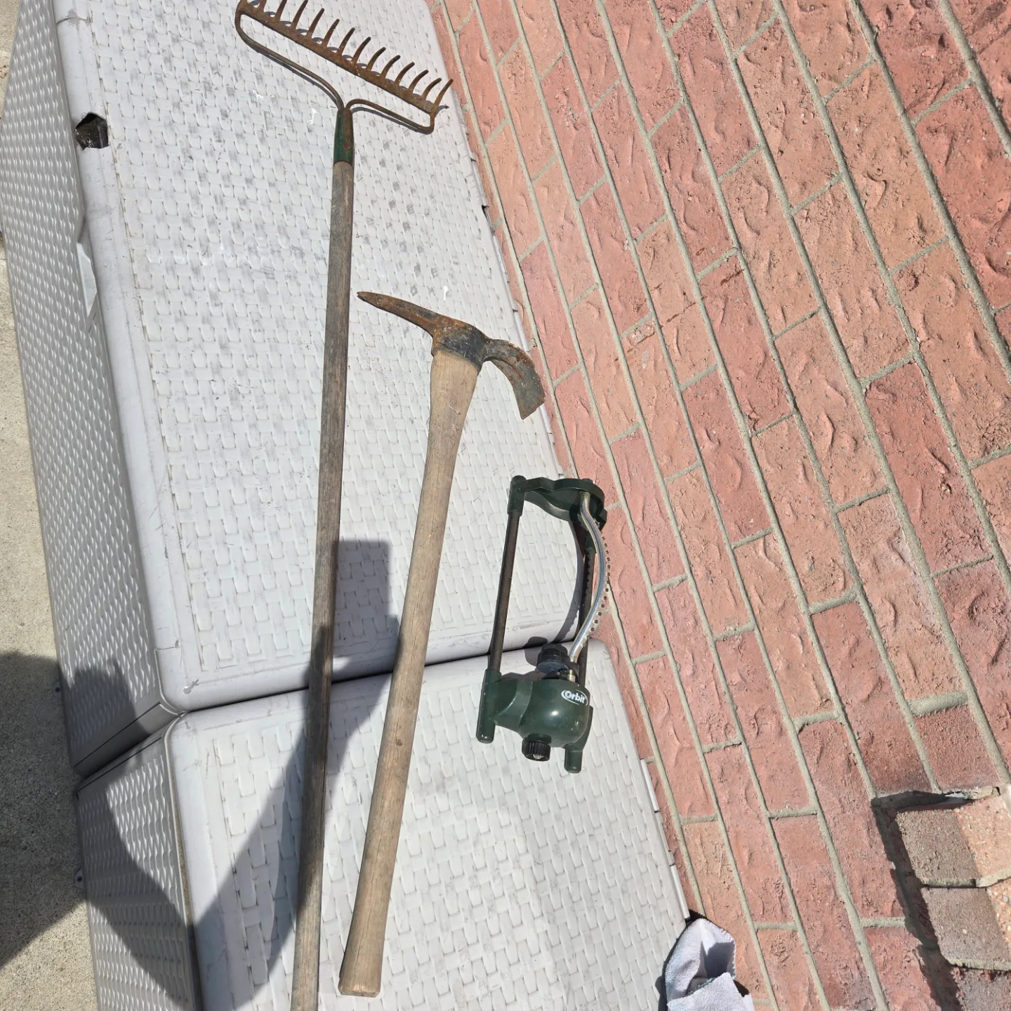 Gardening Tools Bundle: Rake, Mattock, Orbit Sprinkler thumbnail