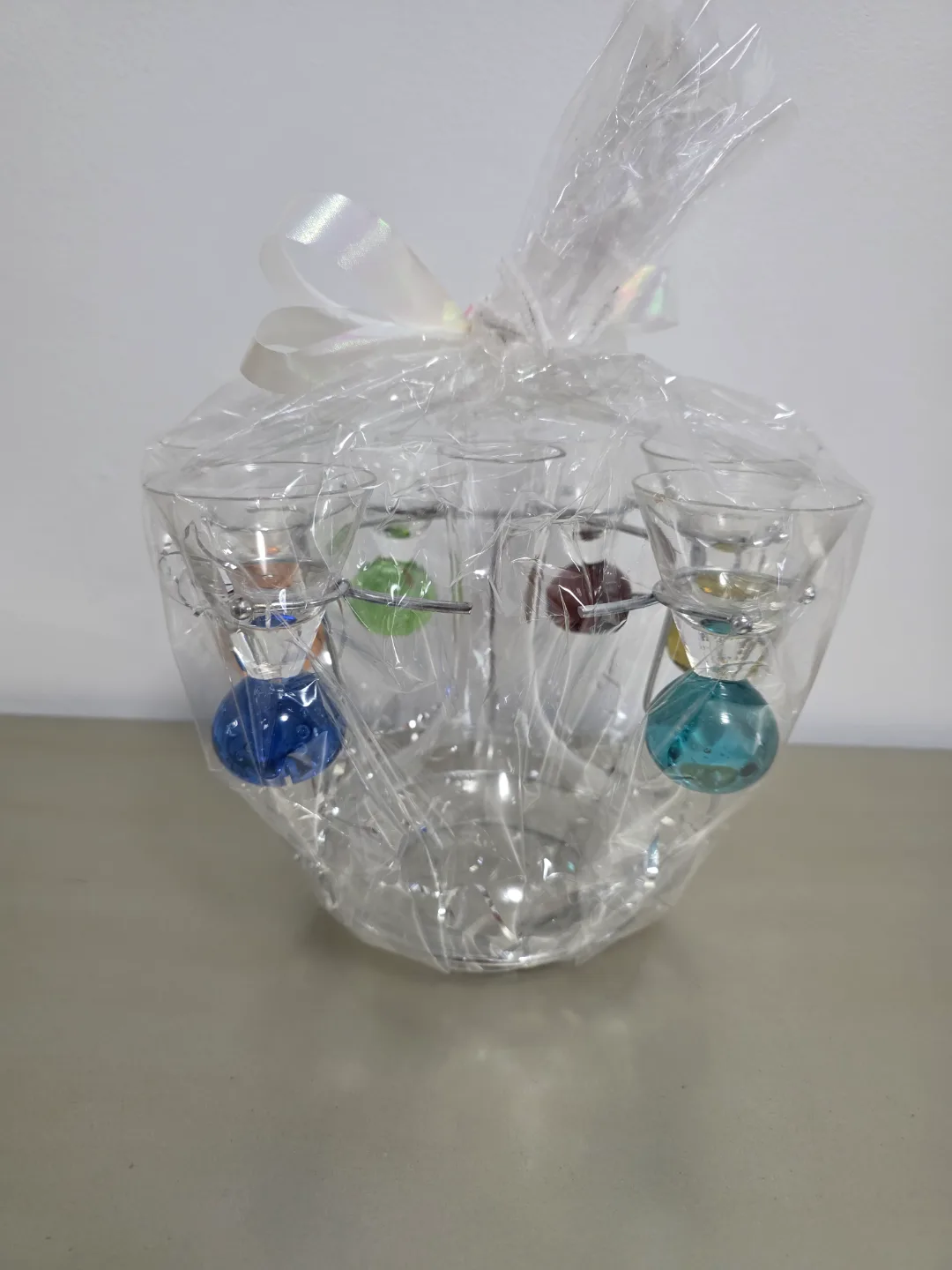 Set of six colourful shot glasses and decanter image indicator(2)