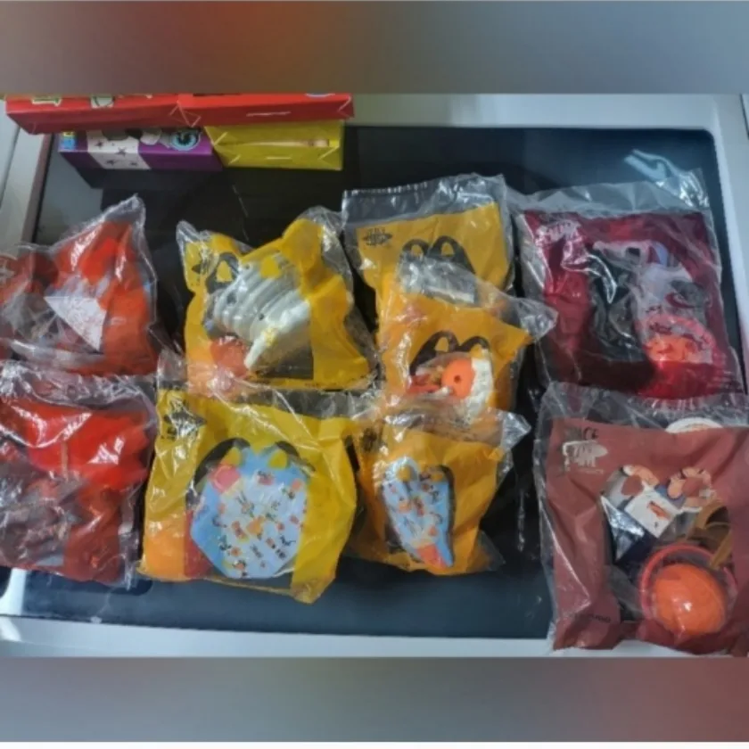 A box full of McDonald's Happy Meal Toys image indicator(3)