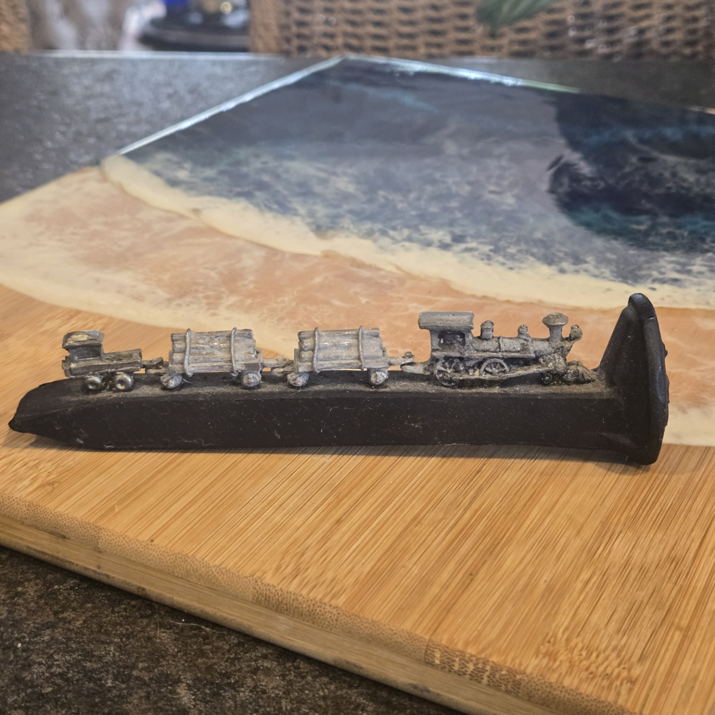 Vintage Pewter Train hauling logs mounted on Railroad Spike