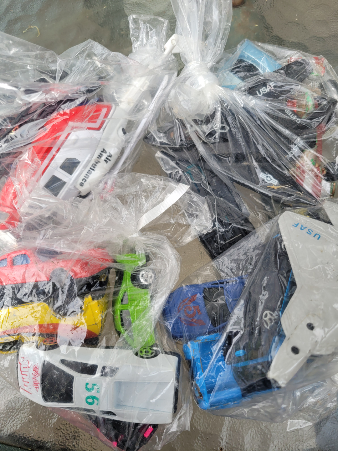 Lot of Toy Vehicles and Helicopter