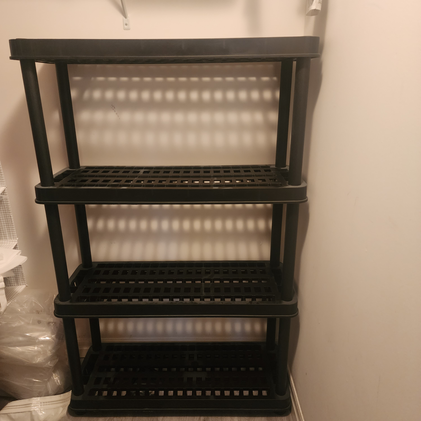 4-Tier Black Plastic Shelving Unit