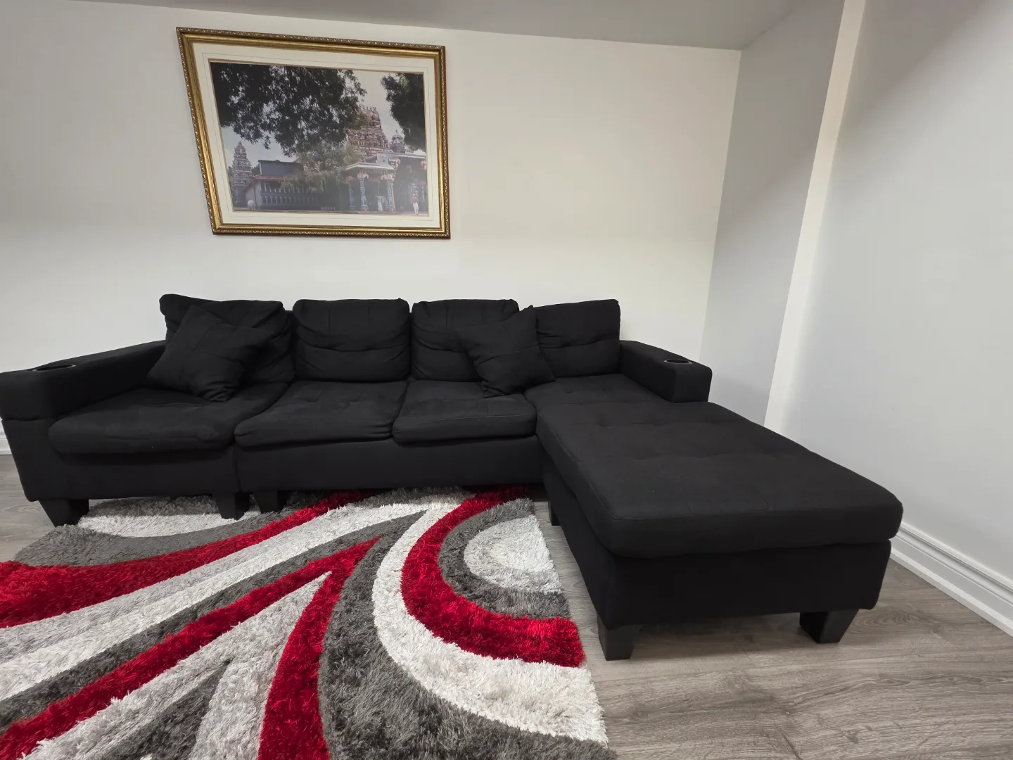 Black sectional sofa with chaise lounge image indicator(3)