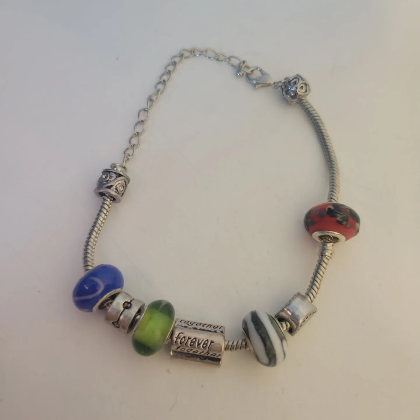 Charm Bracelet and Ricki's earrings set image indicator(3)