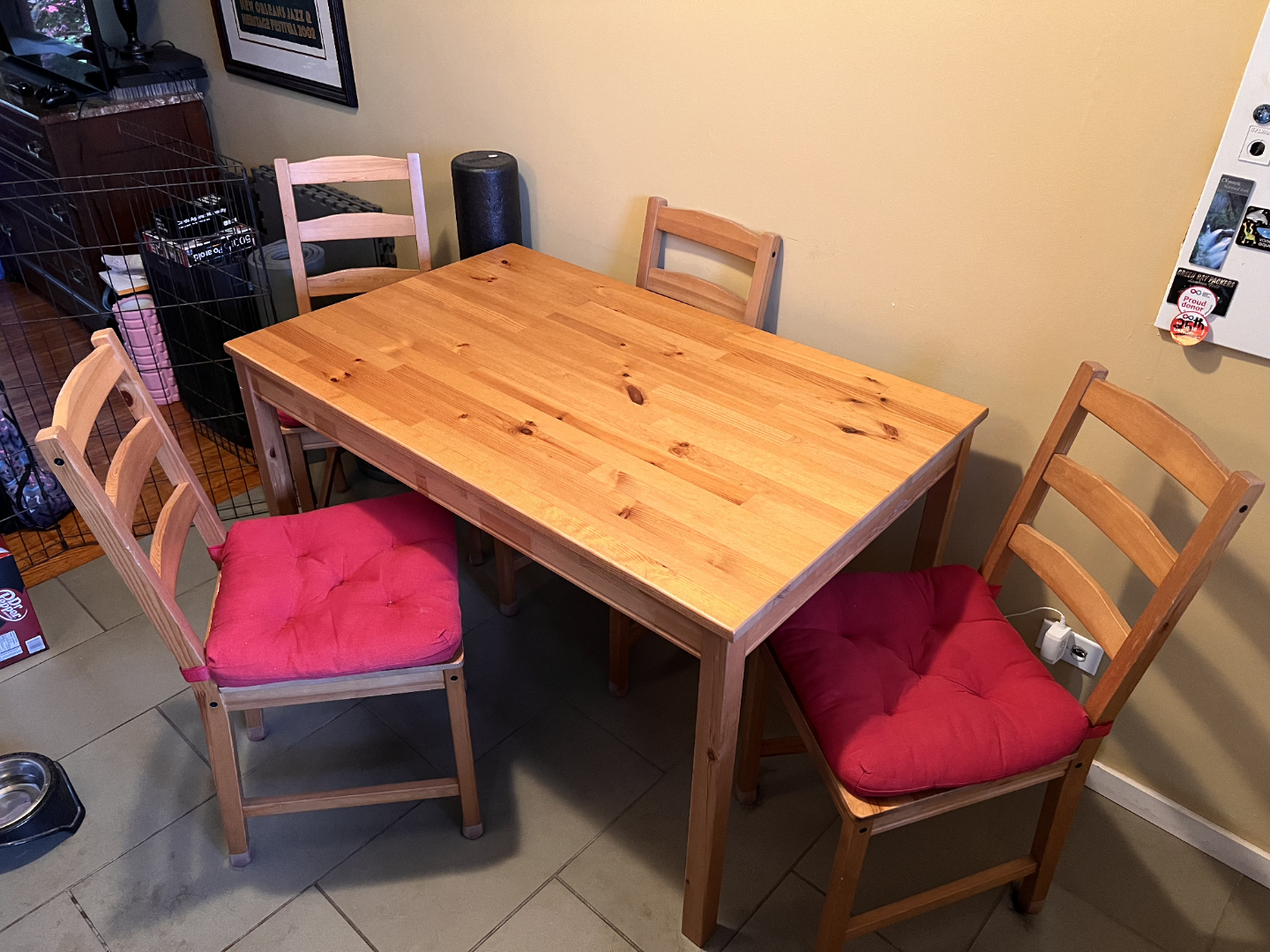 Ikea pine table (Jokkmokk) with 4 chairs + seat covers