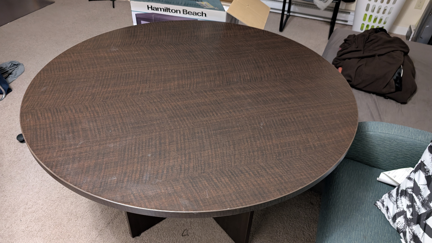 Round Dark Brown Wooden Table