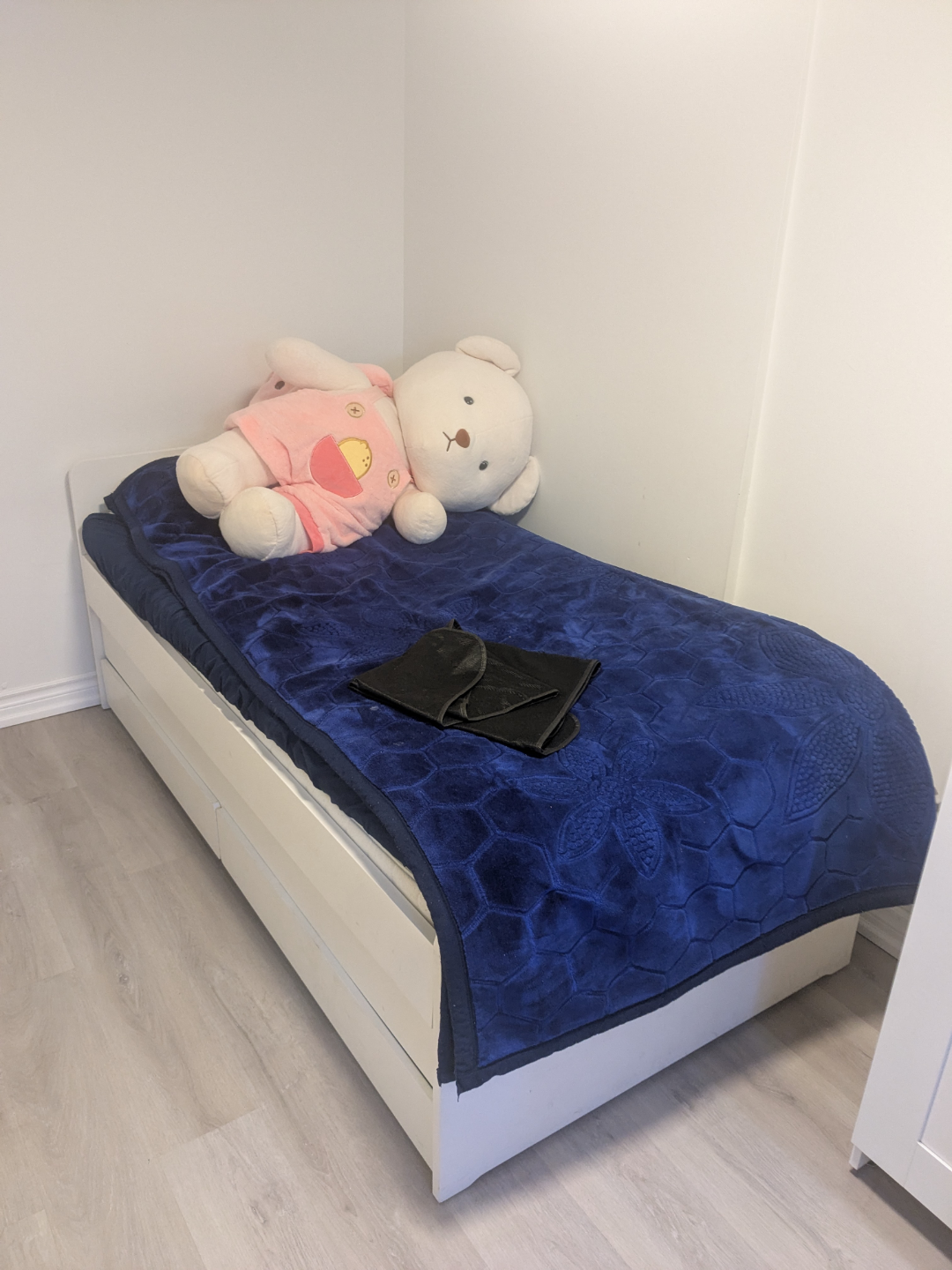 White Twin-Size Bed Frame with Pull-Out Drawer