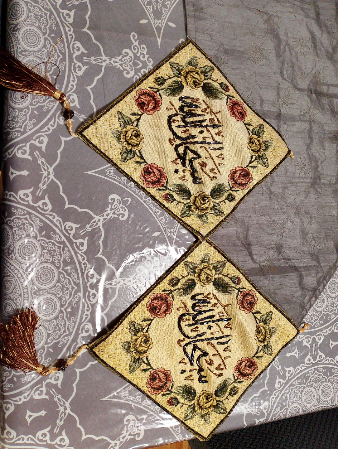 Pair of embroidered Islamic wall hangings thumbnail