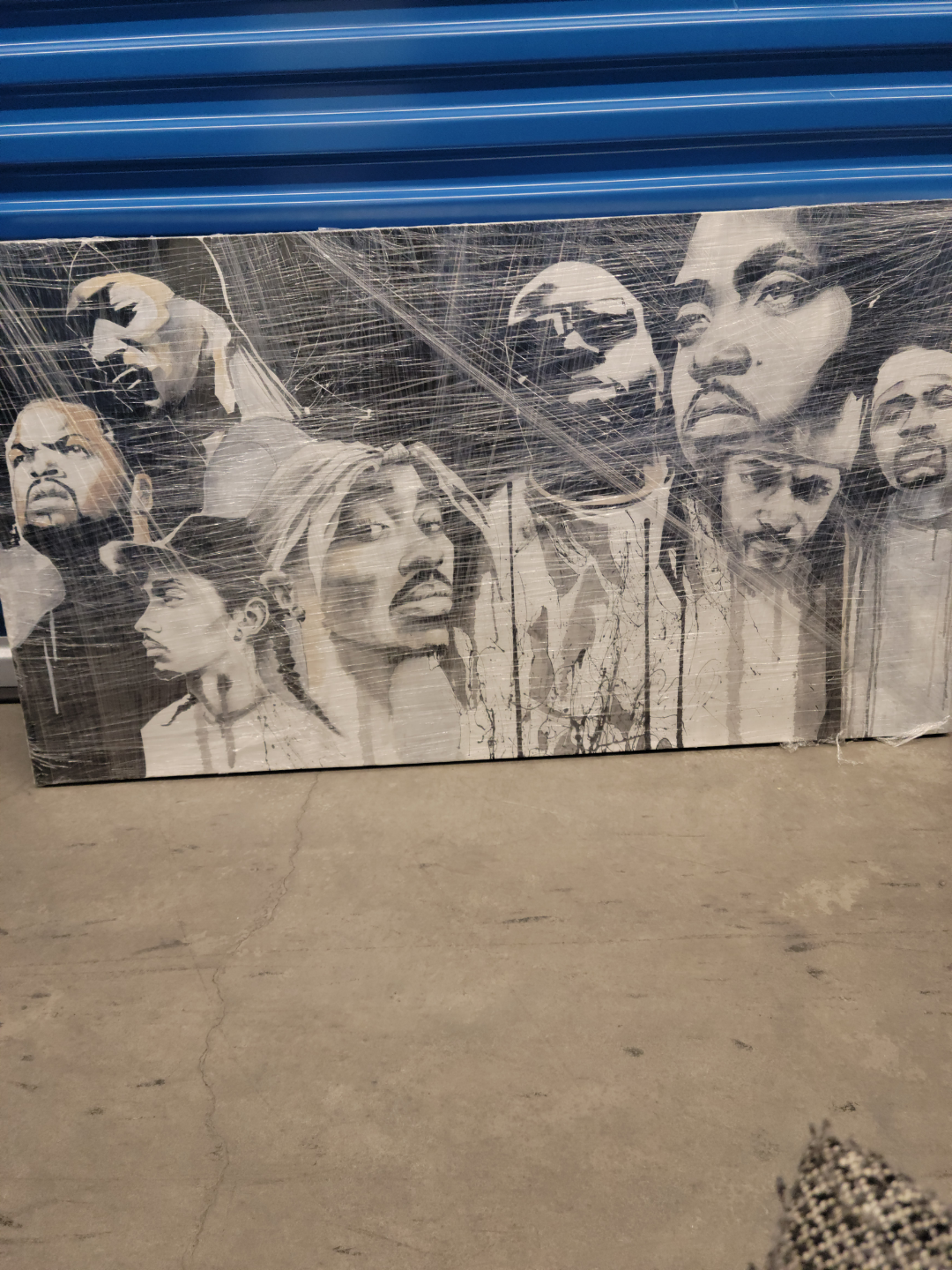 Large Wrapped Canvas Featuring Portraits of Rappers