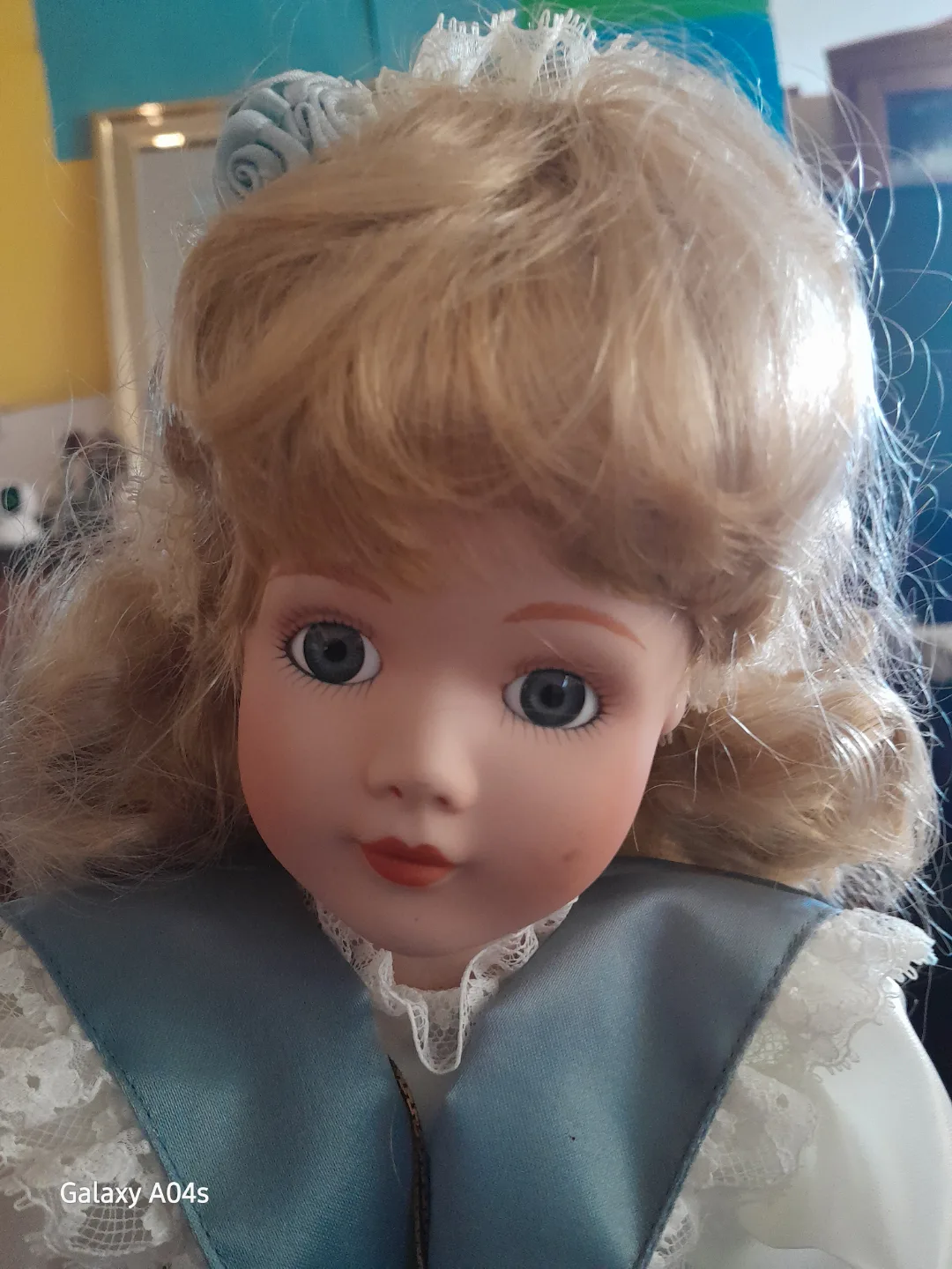 Porcelain Collectible Doll in Blue Gown image indicator(3)