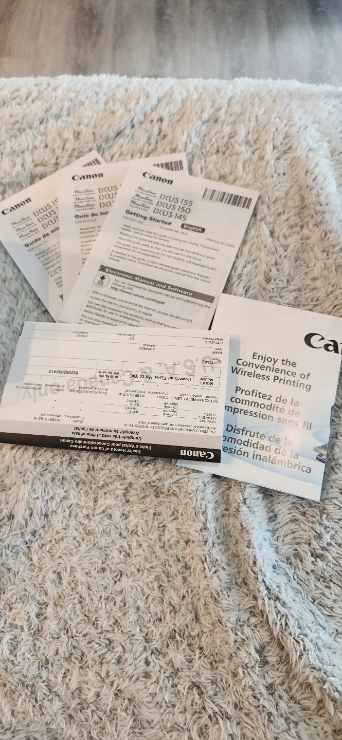 Barely used Canon Powershot ELPH 150 IS with lots of accessories image indicator(3)