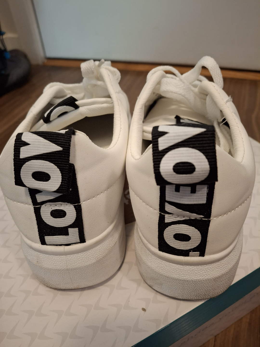 White platform sneakers with LOVE detail