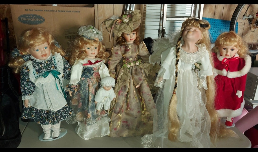 Collection of Porcelain Dolls