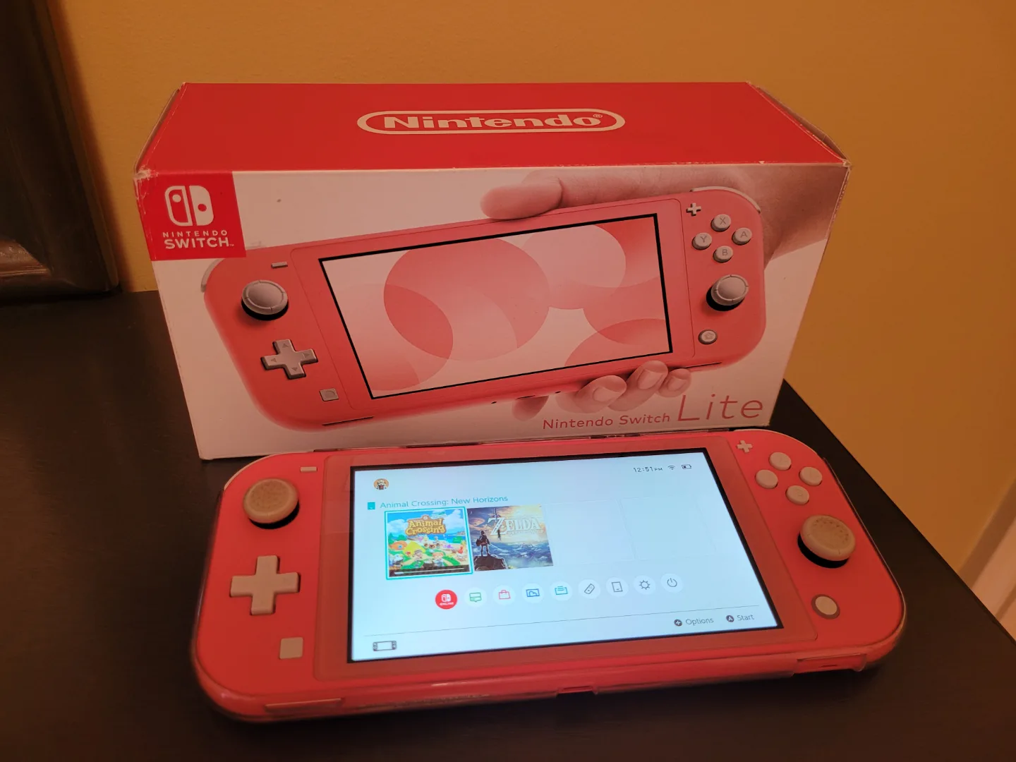 Nintendo Switch Lite Coral with MicroSD Card and more! thumbnail