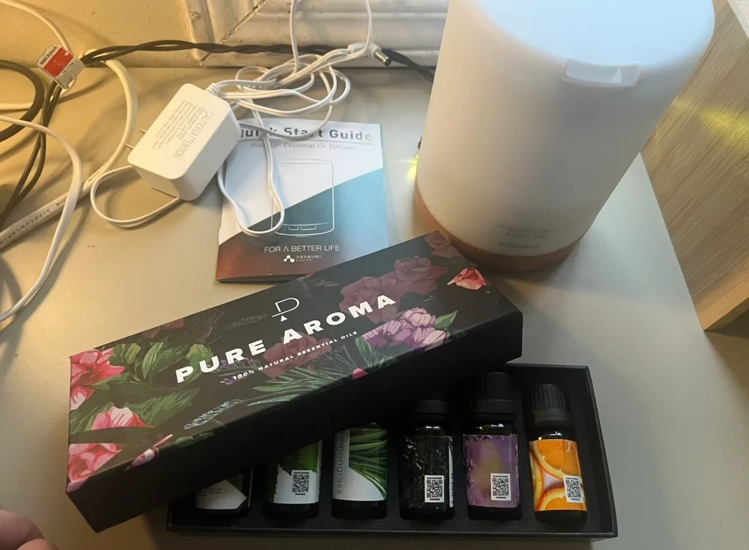 Premium Essential Oil Diffuser + 5 set of Aroma Oils thumbnail