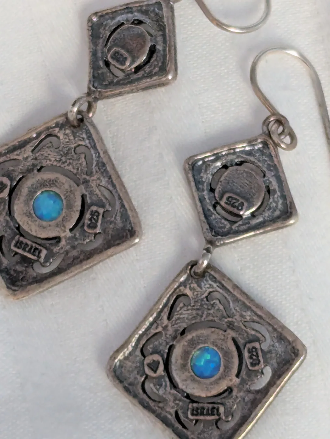 Stunning blue opals set in 925 silver dangle Earrings image indicator(8)