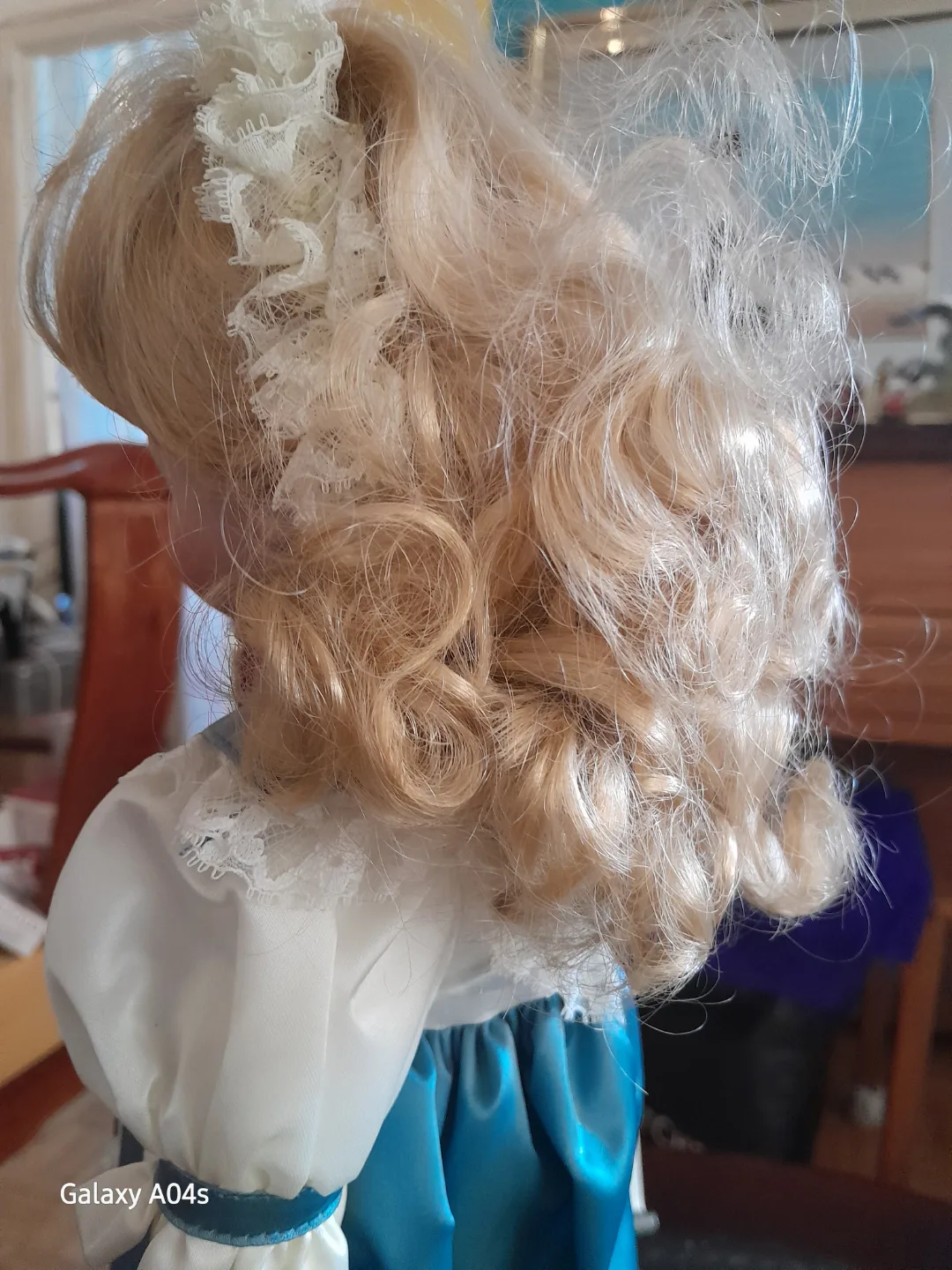 Porcelain Collectible Doll in Blue Gown image indicator(4)