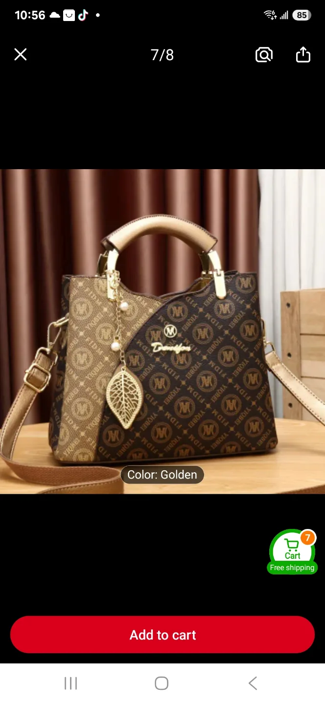 Stylish handbag with shoulder strap image indicator(2)