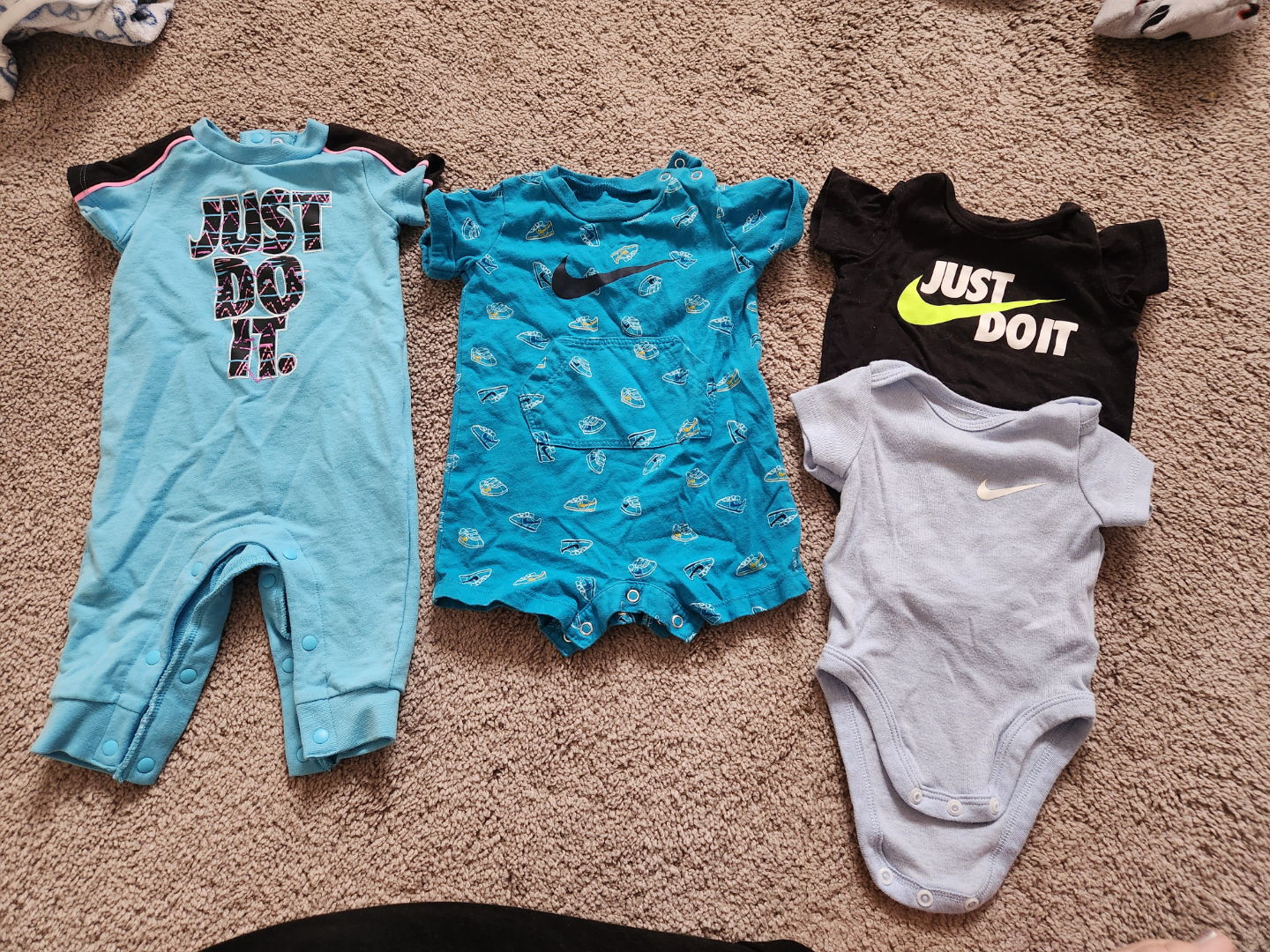 4 Nike Baby Bodysuits