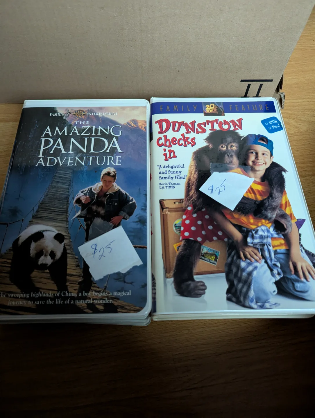 Two VHS tapes: The Amazing Panda Adventure & Dunston Checks In thumbnail