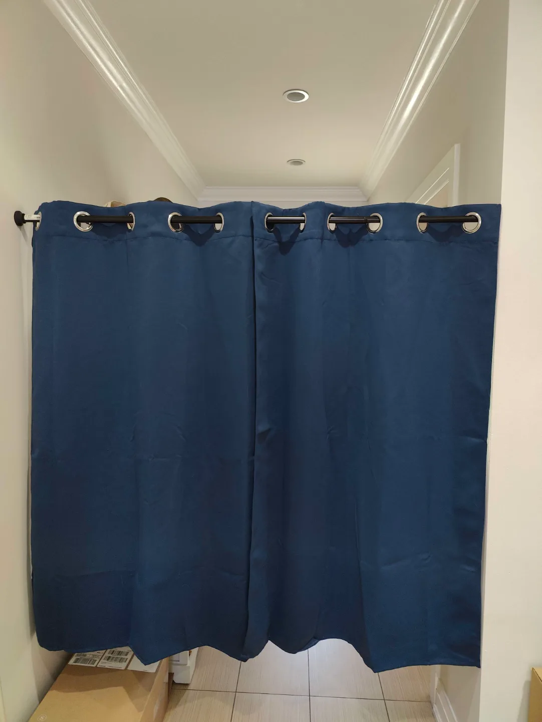 Blue blackout curtains and Ikea tension rod thumbnail