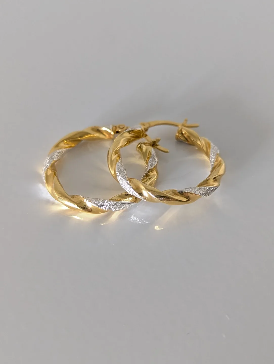 Gold and Silver Twisted Hoop Earrings thumbnail