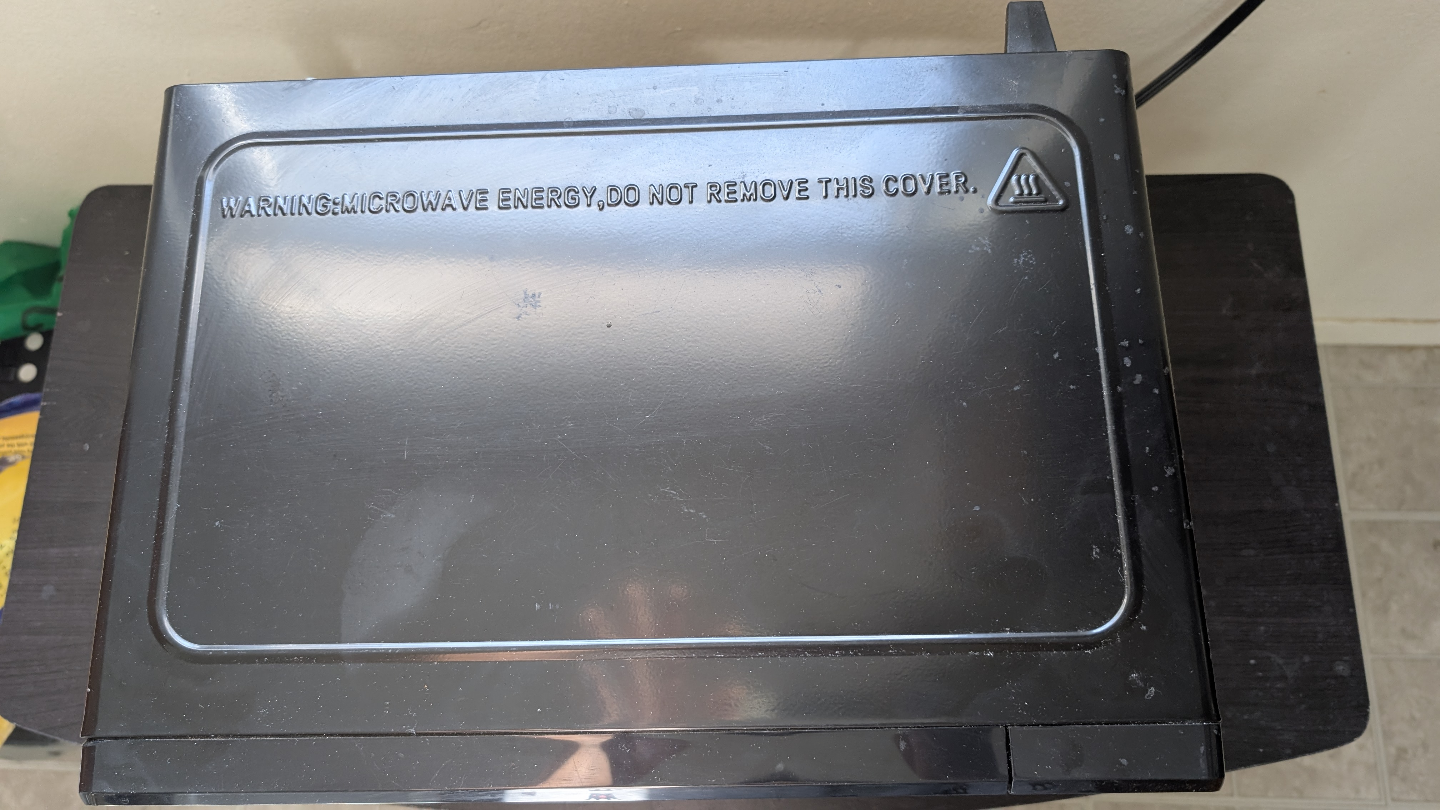 Compact 700W Black Microwave Oven - photo 5