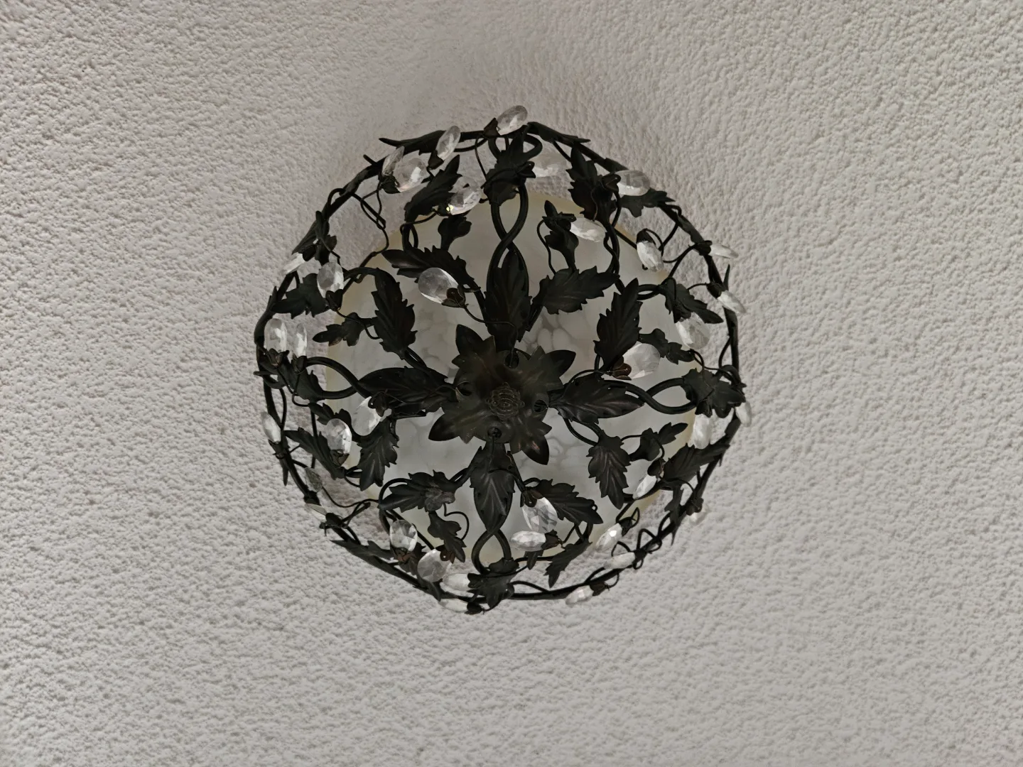 Elegant Black Metal and Crystal Chandelier image indicator(2)