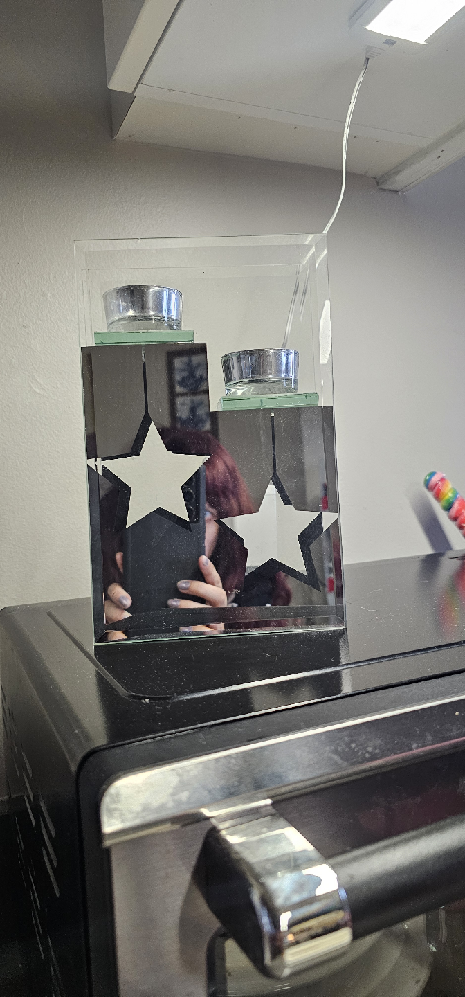Glass candle holder with stars