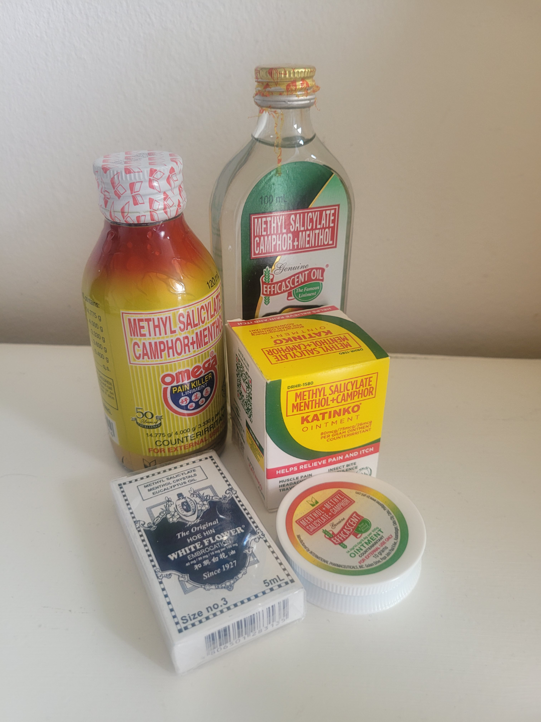 Assorted pain relief balms and oils