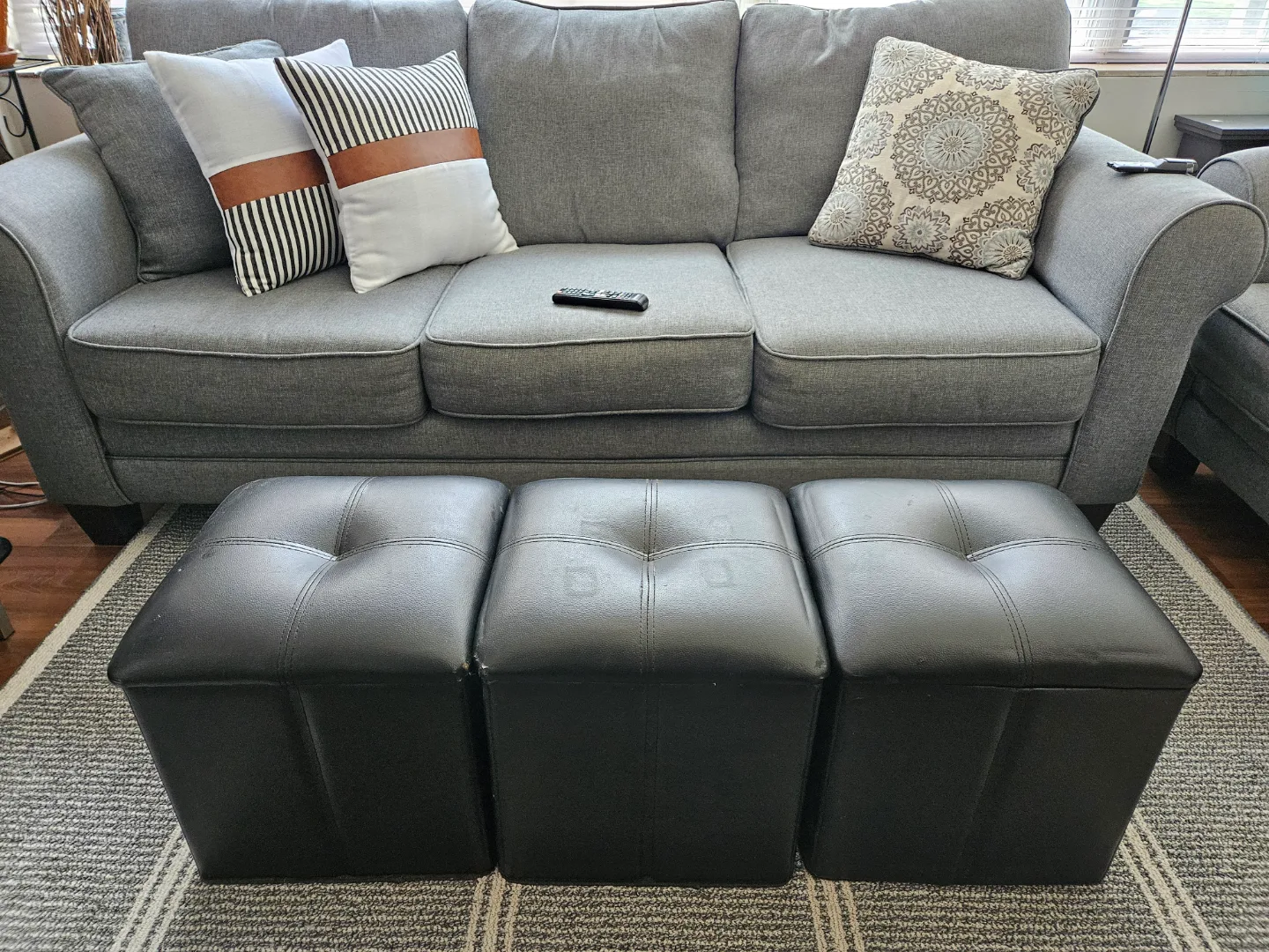 Three Black Storage Ottomans thumbnail
