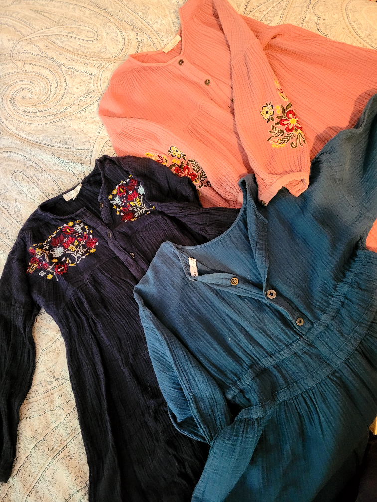 Three embroidered cotton dresses³