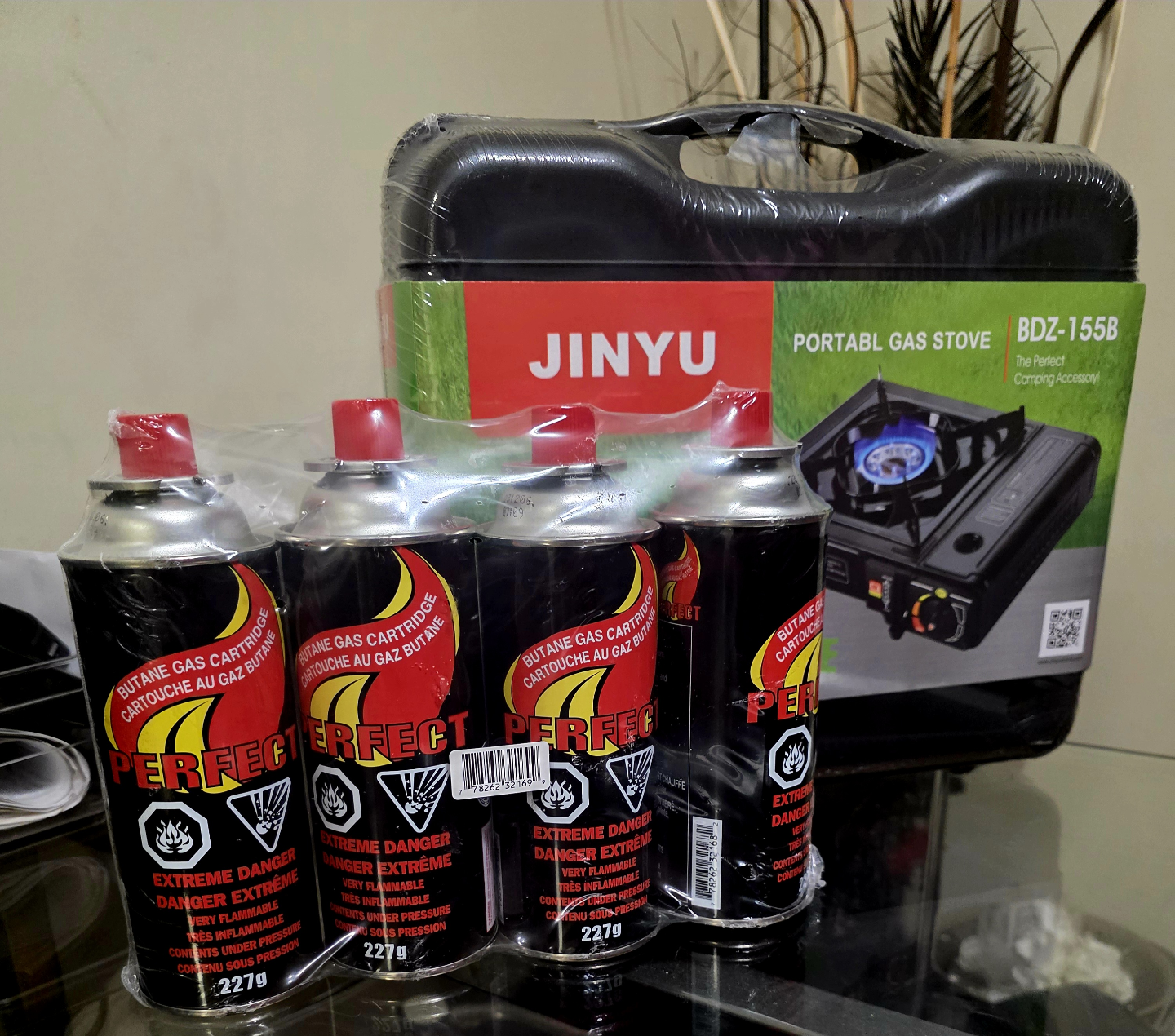 BRAND NEW Portable Butane Gas Stove with Four Fuel Cartridges
