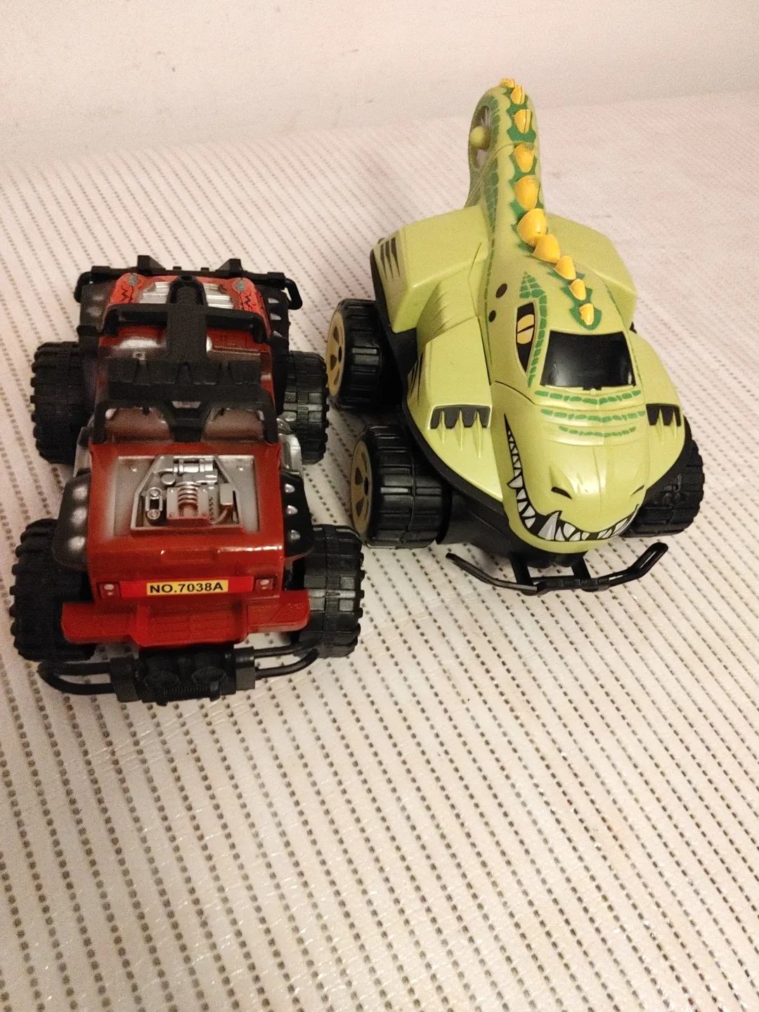 2 ToyMonster Trucks - Red Jeep & Green Dinosaur thumbnail