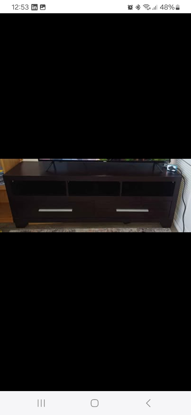 Dark brown TV stand with drawers