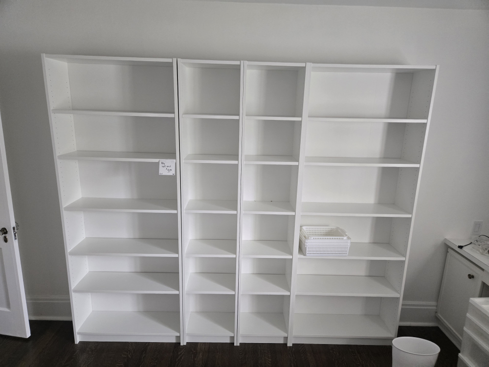 Three White Bookcases