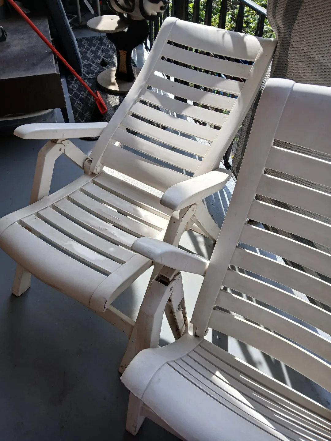 Pair of White Plastic Folding Lounge Chairs image indicator(2)