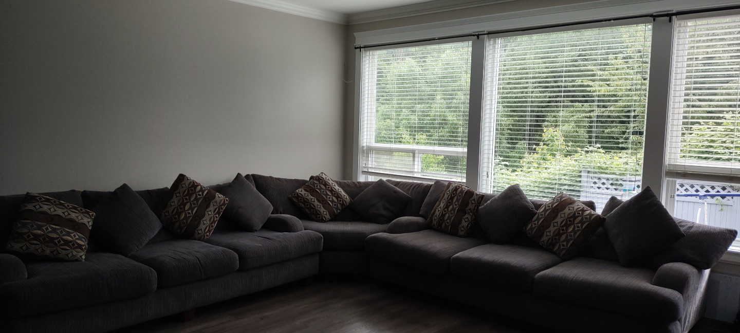 Grey Sectional Sofa with Throw Pillows