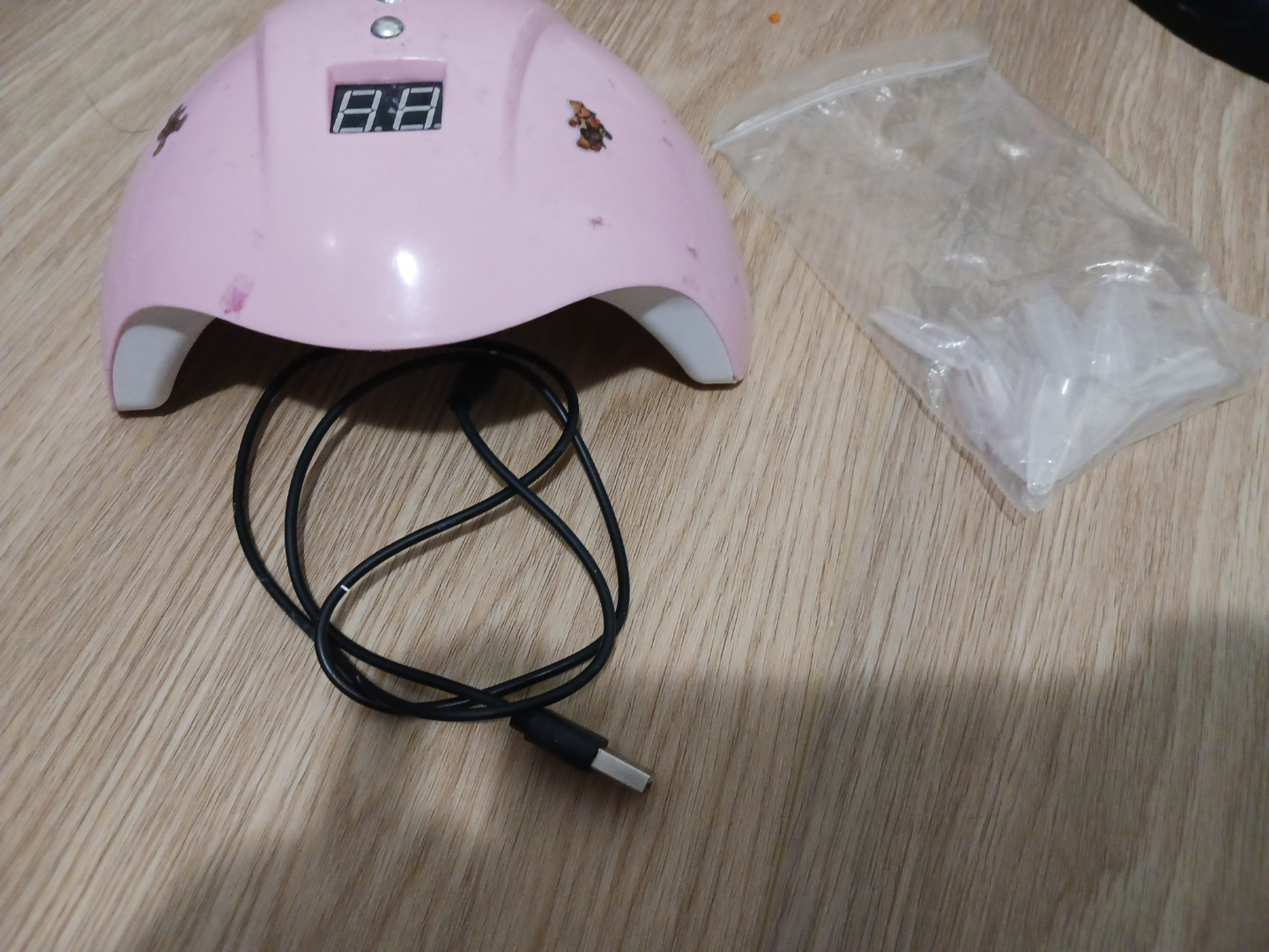 Pink UV Nail Lamp with nail tips