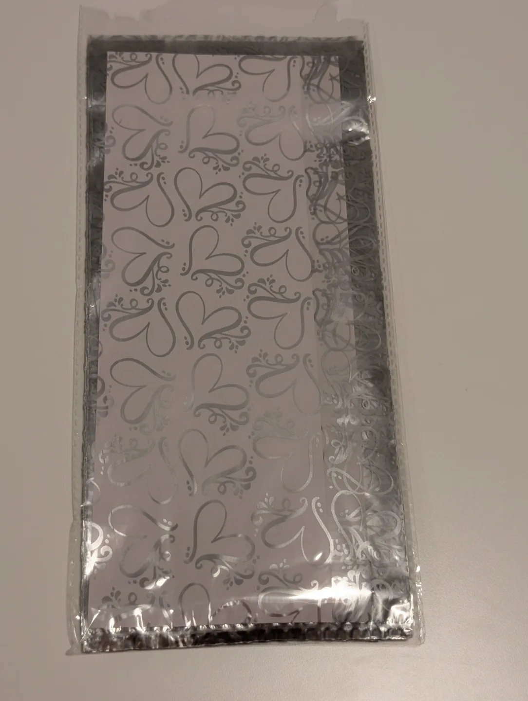 Silver Foil Gift Wrap with Heart Pattern thumbnail