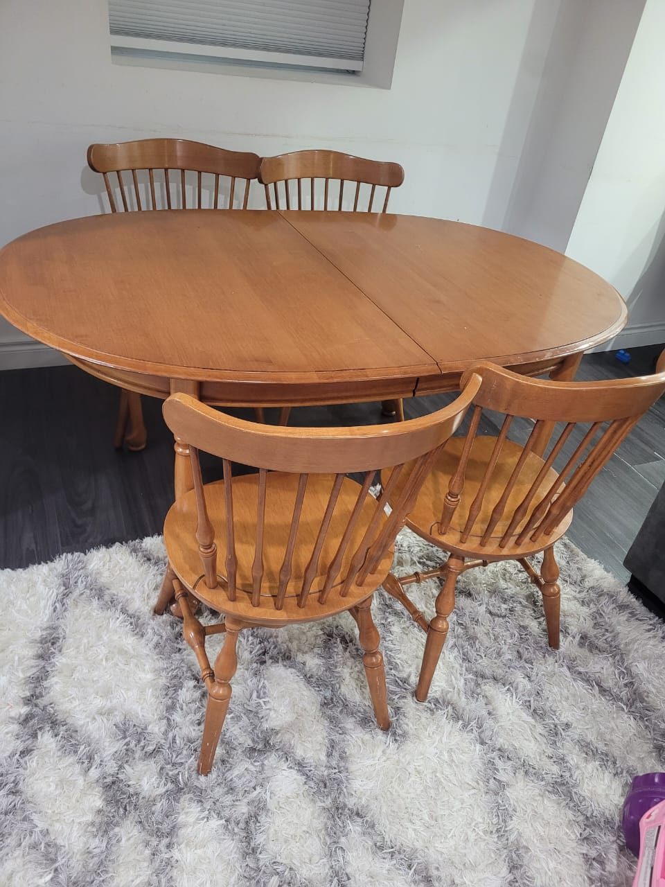 Extendable oval dining table and four chairs