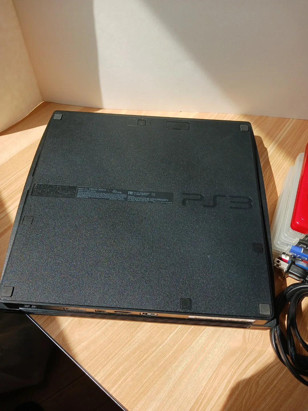 PS3 Slim Console with Controller and  6 Games image indicator(7)