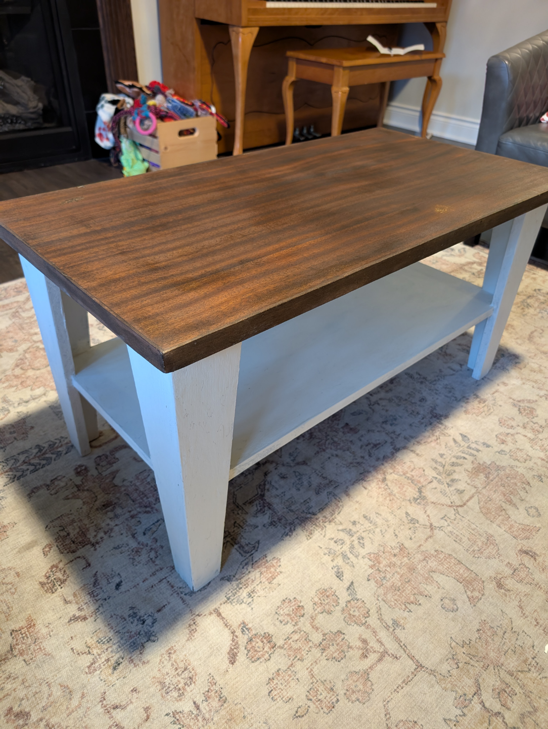 Dark brown top coffee table with white legs
