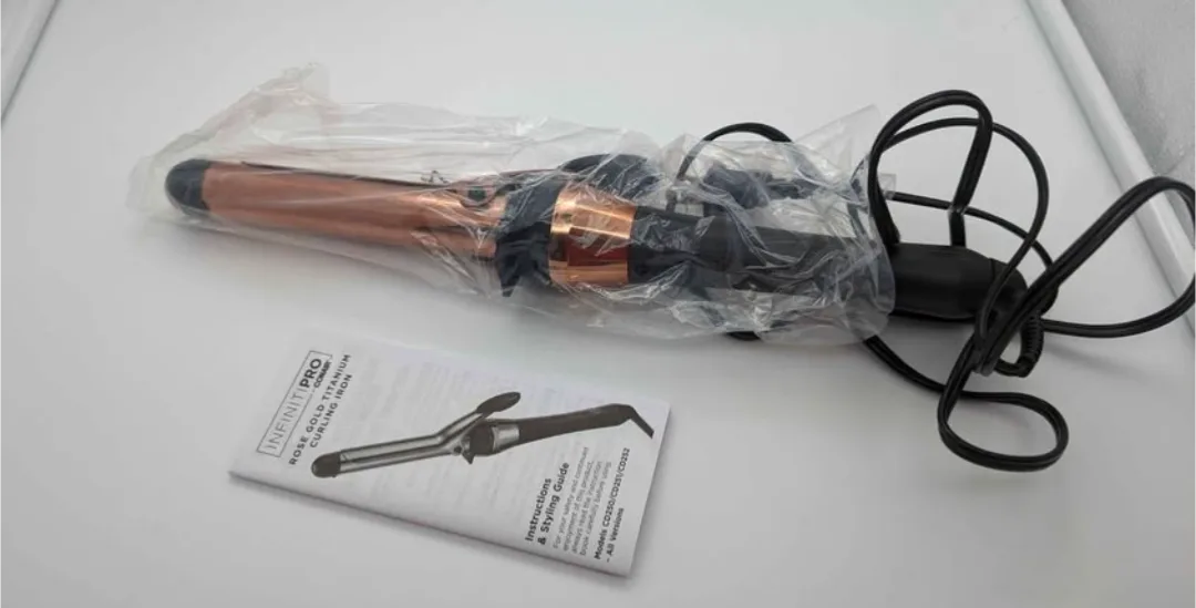 The Pro Infiniti Pro 1 inch Rose Gold Titanium Curling Iron image indicator(3)